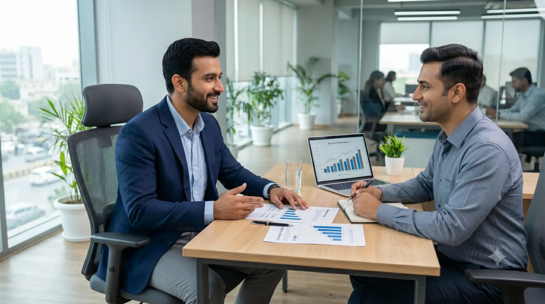 Job candidate professionally discussing salary expectations with an employer during a job offer negotiation.